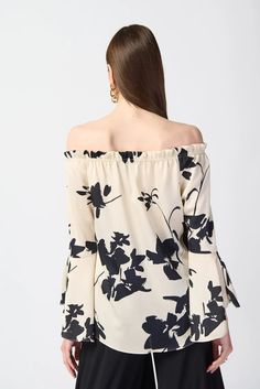 This printed floral top is the epitome of high-low fashion. Made from luxurious satin fabric, this piece features an elegant off-the-shoulder neckline and elastic shirring at the waist. Its long sleeves with ruffled cuffs elevate the top’s contemporary style. DETAILS & CARE 100% Polyester Satin Off shoulder Long sleeves with ruffled cuffs Unlined Hand wash in cold water with like colors Do not bleach Hang to dry in the shade Do not tumble dry Low iron only if needed Do not dry clean Wash garment Spring Off-shoulder Top With Blouson Sleeves, Spring Evening Off-shoulder Top, Evening Off-shoulder Top For Spring, Feminine Off-shoulder Top For Spring Evenings, Off-shoulder Blouse With Blouson Sleeves For Fall, Chic Spring Off-shoulder Top With Long Sleeves, Chic Spring Off-shoulder Top With Blouson Sleeves, Chic Off-shoulder Top With Blouson Sleeves For Spring, Fall Blouse With Blouson Sleeves And Off-shoulder Design