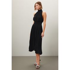 Black crepe (100% Polyester). A-line. Sleeveless. Mock neck. Back button closure. 46.5" from shoulder to hemline. Imported. Sleeveless Midi Dress With Pleated Hem For Work, Chic Sleeveless Dress With Pleated Hem, Chic A-line Sleeveless Dress For Fall, Chic A-line Pleated Sleeveless Dress, Sleeveless Midi Dress With Pleated Hem For Cocktail, Sleeveless Cocktail Midi Dress With Pleated Hem, Chic Sleeveless Midi Length Pleated Dress, Black Sleeveless Dress With Pleated Hem, Chic Sleeveless Midi Dress With Pleats