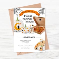 a pizza and pumpkin themed party is on the table