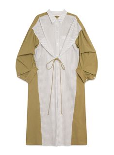 The Porto Riga Dress made by TELA is a long shirt dress with an oversized style, crafted from luxurious bicolor poplin. Designed to be worn loose, this dress exudes effortless elegance and sophistication, perfect for the modern woman. Make a statement with this exclusive and tasteful piece. 84% Cotton, 16% Polyester Oversized style, designed to be worn loose. Take your usual size. Made in Italy Luxury Button-up Shirt Dress With Placket, Luxury Cotton Shirt Dress With Pockets, Luxury Chic Shirt Dress With Button Cuffs, Luxury Shirt Dress With Cuffed Sleeves, Luxury Chic Shirt Dress With Pockets, Luxury Shirt Dress With Spread Collar, Luxury Buttoned Shirt Dress For Women, Luxury Chic Shirt Dress With Asymmetrical Hem, Luxury Long Sleeve Shirt Dress With Pockets