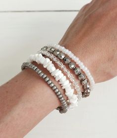 Beaded layered statement cuff bracelet white and gray beads and stones. White Round Beads Bracelets For Layering, White Stacked Bohemian Beaded Bracelets, Adjustable White Beaded Bracelets For Layering, Statement Cuff Bracelet, Beaded Cuff Bracelet, Memory Wire Bracelet, Grey Beads, Multi Strand Bracelet, White Bracelets