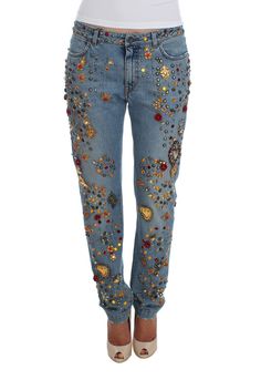 Indulge in the illustrious Italian craftsmanship with these Dolce & Gabbana boyfriend fit jeans, a piece that emanates an aura of enchanted Sicily. With a light blue wash adorned with a dazzling array of crystals forming a heart and roses, these jeans are the epitome of lavish style. The meticulous gold and silver metal detailing enhance the luxurious feel, making them an exclusive addition to your wardrobe. Perfect for those who cherish rare finds and one-of-a-kind fashion statements. Color: Li Jeans Rosa, Dolce And Gabbana Jeans, Dolce And Gabbana Blue, Boyfriend Fit Jeans, Embellished Jeans, Dolce E Gabbana, Jeans Material, Jeans Boyfriend, Boyfriend Fit