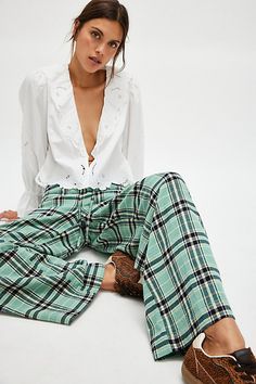 A perfectly plaid version of our Hudson Canyon Stripe Pants, this slouchy pair is featured in a high-rise fit and wide-leg style with a drawstring waistband. **Fit:** High-rise; wide, full-length legs **Features:** Soft cotton fabrication with wide plaid print throughout, adjustable drawstring waistband, pockets for hands, back-pocket detail **Why We ❤ It:** These billowy pants pair perfectly with your favorite tank and strappy sandals. | Hudson Canyon Plaid Pants by Free People in Green, Size: Flare Plaid Pants, Stripe Pants, Trouser Style, Plaid Pants, Plaid Print, Bottom Clothes, Small Waist, Drawstring Waistband, Boho Clothing