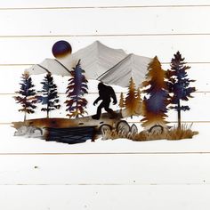 a paper cut out of a person walking in the woods