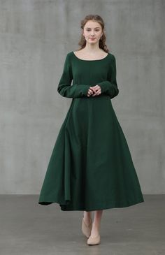 "Linennaive specialises in luxury basics to elevate the everyday. Dark, daring and dramatic - what more could a lady ask for? we finds the beauty in dark romance. Expert craftsmanship and premium materials are introduced to this edgy design vision. This green wool dress features an elegant U shape neckline, draped skirt, long sleeves, gathering details, a fitted silhouette, and a long length. 【Details】 luxurious 100% wool fabric. the color is warm and soft. two deep side pockets, longsleeves 330 Green Winter Dresses, Librarian Style, Pregnancy Clothes, Edgy Design, Royal Outfits, Draped Skirt, Nice Style, Winter Dress, Dress Inspiration