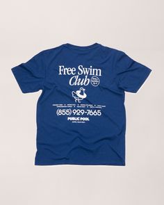 A full image of the back of the blue shirt. Company Merch Design, Event Tshirt Design, Modern T Shirt Design, Simple Tshirt Design, Water Tshirt, Simple Shirt Design, Free Swim Club, Club Tshirts