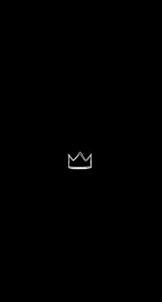 a black and white photo of a crown