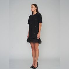 When You’re Ready To Upgrade Your Lbd Dress, We’ve Got Your Number! Our Black Magic Dress Has Hand-Sewn Onyx Colored Stones And Two, Count ‘Em, Two Rows Of Soft And Swingy Ostrich Feathers. Plus Our Le Superbe Signature Chunky Back Zip With A Ribbon Pull (No Partner Dressing Here!). Fashioned Is Super-Soft French Terry, This Lbd Will Be Front And Center In Your Closet For Seasons To Come. Soft French Terry Ostrich Feather Detail Back Zip With Ribbon Pull 80% Polyester 20% Cotton Black Ostrich Feather Dress, Luxury Short Sleeve Mini Dress For Cocktail, Luxury Cocktail Mini Dress With Short Sleeves, Luxury Black Mini Length Dress, Luxury Black Mini Dress, Luxury Black Mini Dress For Cocktail, Navy Blue Lace Dress, Lbd Dress, Magic Dress