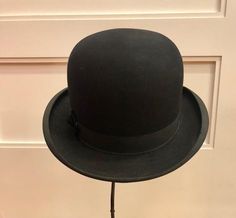 This bowler hat is in excellent vintage condition:  I can find no flaws on the exterior; the interior leather sweatband needs to be reattached - which is how I noticed that the size is indeed marked - 7 3/8!   Could Al Capone have worn this distinctive bowler at one time? What a wonderful example of 1920s menswear at its best! This bowler would certainly enhance - or be the focal point of - your contemporary or vintage ensemble and would be a wonderful addition to your vintage hat collection.Not Vintage Brimmed Hat For Derby, Vintage Brimmed Derby Hat, Classic Cloche Hat For Vintage Events, 1920s Menswear, Black Bowler Hat, Ellicott City Md, Sketches Ideas, John B, Ellicott City