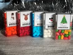 small candy bags with christmas themed candies in them