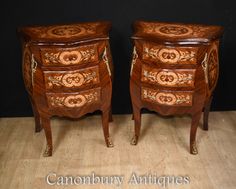 two small wooden chests sitting next to each other