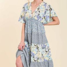 V-Neck Mixed Floral Print Tiered Midi Dress With Flutter Sleeves, Ruffle Trim Along Tiers, Cinched Waist With Elastic No Lining Nwt Blue Midi-length V-neck Dress For Spring, Blue Floral Print V-neck Midi Dress, Blue Floral Print Midi-length V-neck Dress, Lavender V-neck Maxi Dress For Spring, Blue V-neck Maxi Dress For Spring, Spring Light Blue V-neck Maxi Dress, Light Blue V-neck Maxi Dress For Spring, Light Blue Flowy V-neck Midi Dress, Light Blue V-neck Midi Dress For Spring