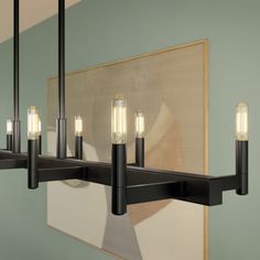 a long rectangular light fixture with five lights on each end and one bulb in the middle