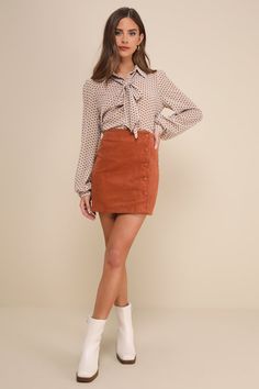 Keep it classic in the Lulus Katherina Rust Brown Button Front Corduroy Skirt! Soft and trendy corduroy shapes this high-waisted skirt with a flattering A-line silhouette and a row of functioning covered buttons along the side. Pair this skirt with a long sleeve top for a fall-approved look! Fit: This garment fits true to size. Length: Mid-thigh. Size medium measures 16.5" from waist to hem. Waist: Fitted - very fitted at natural waist. Hip: Loosely Fitted. Fabric: Fabric has no stretch. Unlined Corduroy Skirt, Front Design, Covered Buttons, Long Sleeve Top, The Row, High Waisted Skirt, Long Sleeve Tops, Sleeve Top, Bleach