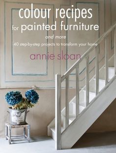 a white staircase with blue flowers on it and the words, color recipes for painted furniture and more 40 step - by - step projects to transform your home