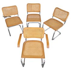 six chairs are arranged in the shape of four