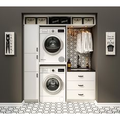 a washer and dryer in a room with grey walls, white cabinets and patterned flooring