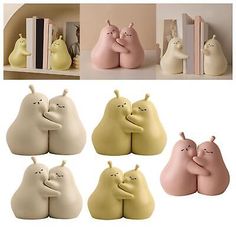 the figurines are hugging each other in different colors and sizes, with bookshelves behind them