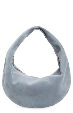 This sculptural shoulder bag crafted from Italian calfskin suede softens your ensembles with its pillowy silhouette. Top zip closure Shoulder strap Lined Leather Made in Italy Designer Handbags Lemon Coffee, Suede Hobo Bag, Unusual Clothes, Rollerball Perfume, Fragrance Design, Purple Bags, Purse Accessories, Fabric Gift Bags, Fabric Bags