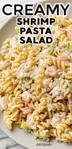 creamy shrimp pasta salad on a white plate