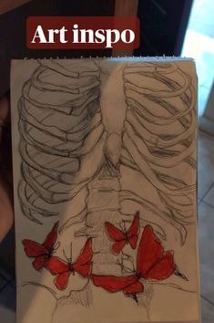 a drawing of a skeleton with red butterflies on it