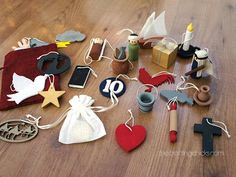 a wooden table topped with lots of different types of toys and decorations on top of it