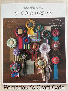 the front cover of a magazine with various ribbons and medals on it's side