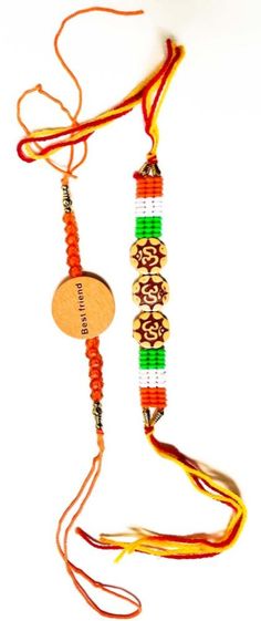 Set Of 2 Rakhi / Orange Wooden & Om Rakhi - My Aashis Orange Bracelet For Festivals As Gift, Orange Bracelets For Festivals Gift, Orange Bracelets As Festival Gifts, Orange Festival Bracelet As Gift, Traditional Beaded Friendship Bracelets, Traditional Friendship Bracelets For Festivals, Traditional Multicolor Friendship Bracelets For Festivals, Multicolor Spiritual Bracelets For Diwali, Spiritual Multicolor Bracelets For Diwali