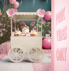 a pink and white cart with cupcakes on it sitting in front of balloons