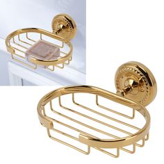 a gold plated toilet paper holder with a marble in the middle and an image of a soap dish