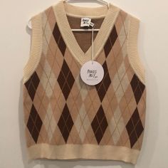 Princess Polly Nwt Poppy Vest Top In Brown Oversized Sweater Vest. Shades Of Brown And Cream Argyle Print Throughout. V Cut Neck. Perfect For Any Time Of Year As It Can Be Worn Alone Or Over Sleeves. Size Xs/S. Brown Oversized Sweater, Oversized Sweater Vest, Argyle Vest, Argyle Print, Argyle Sweater Vest, Shades Of Brown, Argyle Sweater, V Cut, V Cuts