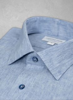 The Alexander in Blue Fade Mélange Linen Shirt evokes the casual Italian live/work lifestyle. Wear as you would a white shirt--can pair with tans, whites, or earth tones. Made from a linen/poly blend, the result is a supersoft touch. With custom dark blue “ombre” buttons that add a unique and custom touch to the overall look. Can be dressed up under a sport jacket, or simply worn untucked, for a more casual, after-hours look. The Alexander is the trimmest of all our fits, calibrated to accentuat Work Lifestyle, Athletic Body Type, Sport Jacket, Custom Buttons, Blue Ombre, Sports Jacket, Earth Tones, Linen Shirt, White Shirt