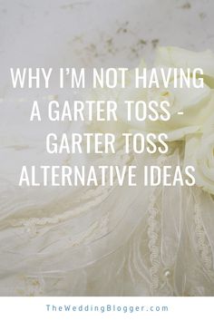 a bouquet of white roses with the words why i'm not having a garter toss