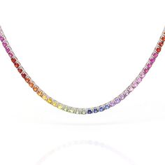 Natural Rainbow Sapphire Solid Gold Tennis Chain ◆ Stone Details ◆ Stone: Natural Multi Color Sapphires Stone Shape: Round Stone Size: 2.3mm Stone Weight: 13.10 cts (approx) ◆ Metal Details ◆ Metal: 14K, 18K Gold Colors: Yellow Gold, White Gold, Rose Gold Length: 16 inches ◆ Shipping Details ◆ Via FedEx Express Made to Order & Shipped within 10 Days Delivery: Within 7 Days Tracking ID provided ◆ Personalization ◆ Want to change stone colors? More of pink? Or remove a color perhaps? We can custom Elegant Rainbow Crystal Jewelry, Rainbow Cubic Zirconia Jewelry With Sparkling Stones, Elegant Rainbow Jewelry With Sparkling Stones, Multicolor Crystal Jewelry With Sparkling Stones, Fine Jewelry Multicolor Gemstones For Jewelry Making, Multicolor Fine Gemstones For Jewelry Making, Multicolor Fine Jewelry Gemstones For Jewelry Making, Multicolor Crystal Jewelry With Stones, Multicolor Cubic Zirconia Jewelry With Sparkling Stones