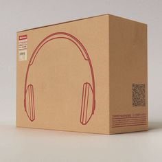 a cardboard box with headphones on it