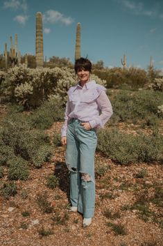 The prettiest purple top! Ruffled in all the right places... Solid textured Long sleeve Button down shirt Ruffle around the shoulder Nic sheer collared shirt 100% polyester Models are 5'3" and 5'4" and wearing a size small. Small: 2-4 Medium: 6-8 Large: 10-12 Lavender Tops, Pocket Belt, Purple Top, Collared Shirt, Jeans For Sale, Favorite Jeans, Button Down Shirt, Lavender, Models