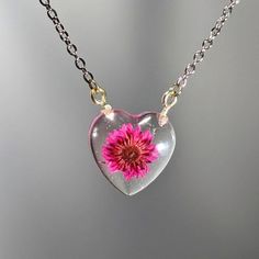 Luxury Handmade Resin Jewelry, Handmade Minimalist Flower Pendant Necklace, Minimalist Handmade Flower Pendant Charm Necklace, Minimalist Handmade Charm Necklace With Flower Pendant, Minimalist Handmade Flower Pendant Necklace, Handmade Minimalist Flower Necklace, Handmade Clear Flower Necklace, Clear Flower Pendant Necklace As Gift, Clear Flower Pendant Necklace For Gift