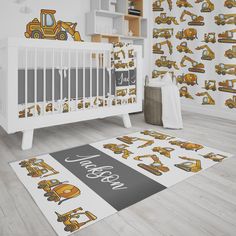 a baby's room with construction themed wallpaper and rugs