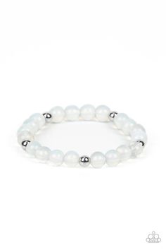 Infused with silver accents, a dreamy collection of glassy and opalescent white beads are threaded along a stretchy band around the wrist for an enchanting glow. Sold as one individual bracelet. Shopping Jewelry, White Bracelet, Feeling Pretty, Iridescent Blue, Party Necklace, White Bracelets, Paparazzi Accessories, Stretchy Bracelets, Paparazzi Jewelry