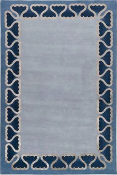 a blue rug with an intricate border