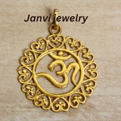 18k gold Om, Om charm, Om necklace, solid gold Om pendant, yoga gifts, yoga jewelry, spiritual gifts, Ohm necklace gold, Buddhist jewelry. Gemstone-Na Jewelery Category:- Handmade -Pendant Metal:-Brass -- T H E * Q U A L I T Y We buy raw gemstones directly from miners and then get them cut and polished at our workshop , Therefore saving some bucks (additional added fees and markups) avoiding a middle man and making sure of the authenticity of the gems. And we use top quality materials that are water safe (ideally) However it is highly recommended to avoid water since doing so will prolong the durability and quality of your jewelry. Also, we recommend avoiding contact with chemicals such as bleach, perfume and sunscreen because they can damage the material over time which will affect its qu Gold Personalized Spiritual Charm Necklaces, Holistic Gold Pendant Jewelry, Spiritual Gold Charm Necklaces With Round Pendant, Spiritual Gold Charm Necklace With Round Pendant, Gold Spiritual Charm Necklaces With Round Pendant, Gold Spiritual Charm Necklace With Round Pendant, Gold Round Pendant Charm Necklace Spiritual Style, Traditional Gold Pendant Charm Necklace, Traditional Handmade Gold Charm Necklaces