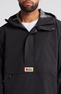 Hike the open trail in this durable, weather-resistant anorak simply styled with an adjustable hood and a trio of pockets. The loose fit and front/side zippers make it easy to pull on or take off and wear with other layers. Half-zip closure with snap storm placket; side zip closure Drawcord-toggle hood Adjustable hook-and-loop cuffs Flap kangaroo pocket; zip hand pockets Packable PFC-free durable water-repellent (DWR) finish Mesh lining 73% recycled polyester, 27% polyurethane Machine wash, tumb Utility Windbreaker With Functional Pockets For Outdoor Activities, Black Raincoat With Pockets For Hiking, Practical Outerwear With Pockets For Camping, Fall Hiking Windbreaker With Functional Pockets, Practical Outerwear With Functional Pockets For Outdoor Activities, Urban Style Windbreaker With Functional Pockets For Outdoor Activities, Urban Windbreaker With Functional Pockets For Outdoor Activities, Black Windbreaker With Functional Pockets For Outdoor Activities, Black Windbreaker With Functional Pockets For Outdoor