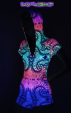 Free delivery to USA, Canada, UK, Europe, Australia & Japan! Hooded Playsuit : Rainbow Fractal Fully printed lycra hooded playsuit / romper with a lined hood. UV Active ! Cotton lycra fabric (95% cotton, 5% lycra) Please note, The pattern & colours can vary a bit, depending on which part of the fabric is used. Artwork by Space Tribe Shipping weight : 0.40 kg. Sizes available, S/M. M/L For size guide see last photo. DELIVERY. All goods are shipped from Bali. We will need a telephone numbe Fitted Rave Unitard For Festivals, Rave Stretch Unitard For Festivals, Rave Style Stretch Unitard For Festivals, Rave Unitard With Stretch For Festivals, Rave Unitard With Stretch Fit For Festivals, Rave Bodysuit For Music Festival, Rave Bodysuit For Music Festival With Stretch, Rave Stretch Bodysuit For Music Festival, Multicolor Stretch Rave Unitard