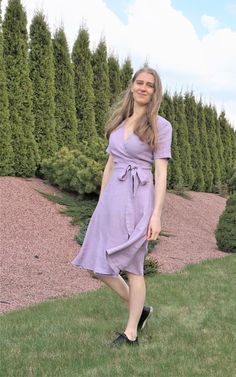 Custom orders and items purchased during major sales cannot be returned or exchanged. Minimalist, elegant and stylish lilac wrap dress is the perfect choice for summer. Style this lovely linen dress with heels if you are wearing it as a bridesmaid dress, wedding guest dress or as a cocktail party dress. Wear with flats for work, for more casual occasions or for a romantic walk in the city. This dress is knee length. It features V-neckline and deep side pockets. A-line silhouette is flattering to Wedding Guest Dress Lilac, Feminine Lavender V-neck Midi Dress, Summer Purple Midi Dress, Lavender Knee-length Midi Dress For Spring, Lavender Knee-length Dress For Garden Party, Fitted Lavender Midi Dress For Summer, Lavender Midi Dress For Garden Party, Summer Short Sleeve Lavender Midi Dress, Short Sleeve Lavender Midi Dress For Summer