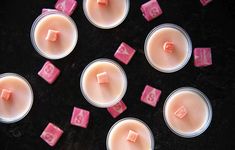 several pink wax cubes sitting on top of each other