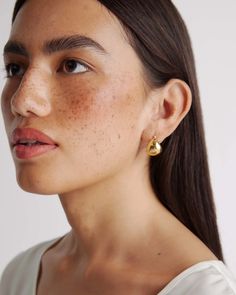 Globe Boho Hoops Classic Gold Tarnish Resistant Hoop Earrings, Classic Gold Tarnish-resistant Hoop Earrings, Classic Everyday Gold Plated Hoop Earrings, Everyday Gold-plated Huggie Earrings, Timeless Gold Teardrop Huggie Earrings, Classic Yellow Gold Plated Hoop Earrings, Gold-tone Classic Huggie Earrings For Everyday, Classic Gold-tone Gold-plated Hoop Earrings, Everyday Luxury Gold Plated Huggie Earrings With Polished Finish