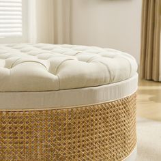 a close up of a round ottoman on the floor