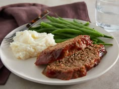 meatloaf, mashed potatoes and green beans on a plate