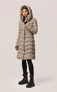 - Engineered to deliver warmth up to -15 °C (5 °F), the LITA-TD by SOIA & KYO is a below-knee-length fit & flare style puffer with a protective collar, knit storm cuffs and hood. - This cold-weather essential is expertly tailored with RDS certified lightweight down and 100% recycled water-repellent quilted nylon for a fashionably functional winter experience. - Chevron quilting, hooded - Center front closure with YKK 2-way METALUXE® zipper - 1x1 rib knit storm cuffs with thumb holes - In-seam po Down Winter Coats, Coat With Hood, Chevron Quilt, Down Coat, Puffer Coat, Fit & Flare, Winter Coat, Fit And Flare, Blazer Jacket