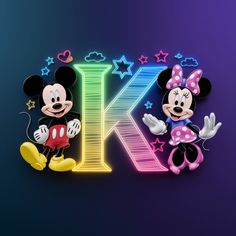 mickey and minnie mouse standing next to each other in front of the letter'k '